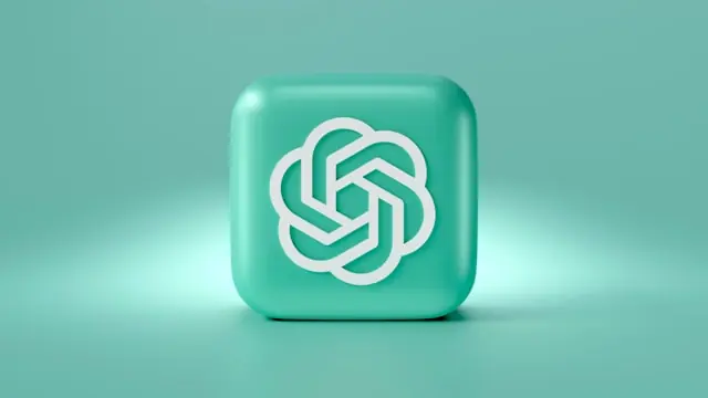 Weißes OpenAI-Logo auf einem türkisfarbenen Würfel vor gleichfarbigem Hintergrund als Bezug zum geplanten Börsengang des KI-Unternehmens